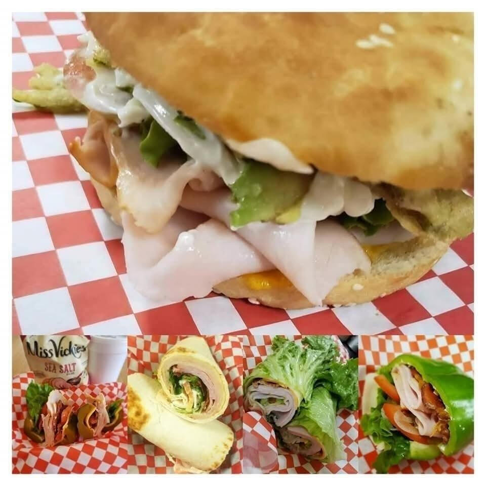 City Market Entrance in Richland Hills, TX Front entrance of City Market in Richland Hills, Texas, where Levi's Lunchbox is located. The building features a red-trimmed metal roof with signs for honey and drinks.
